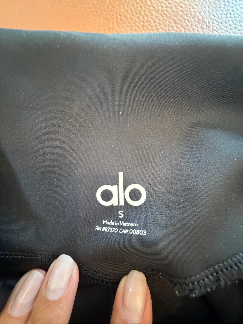 Alo Yoga High-Waist Black Leggings w/ Mesh Panels & Side Pockets